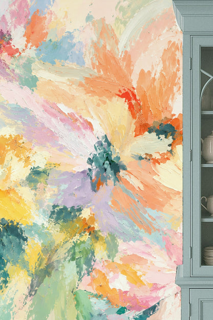 Cozy reading nook with floral wallpaper in soft peach, blue, and yellow tones