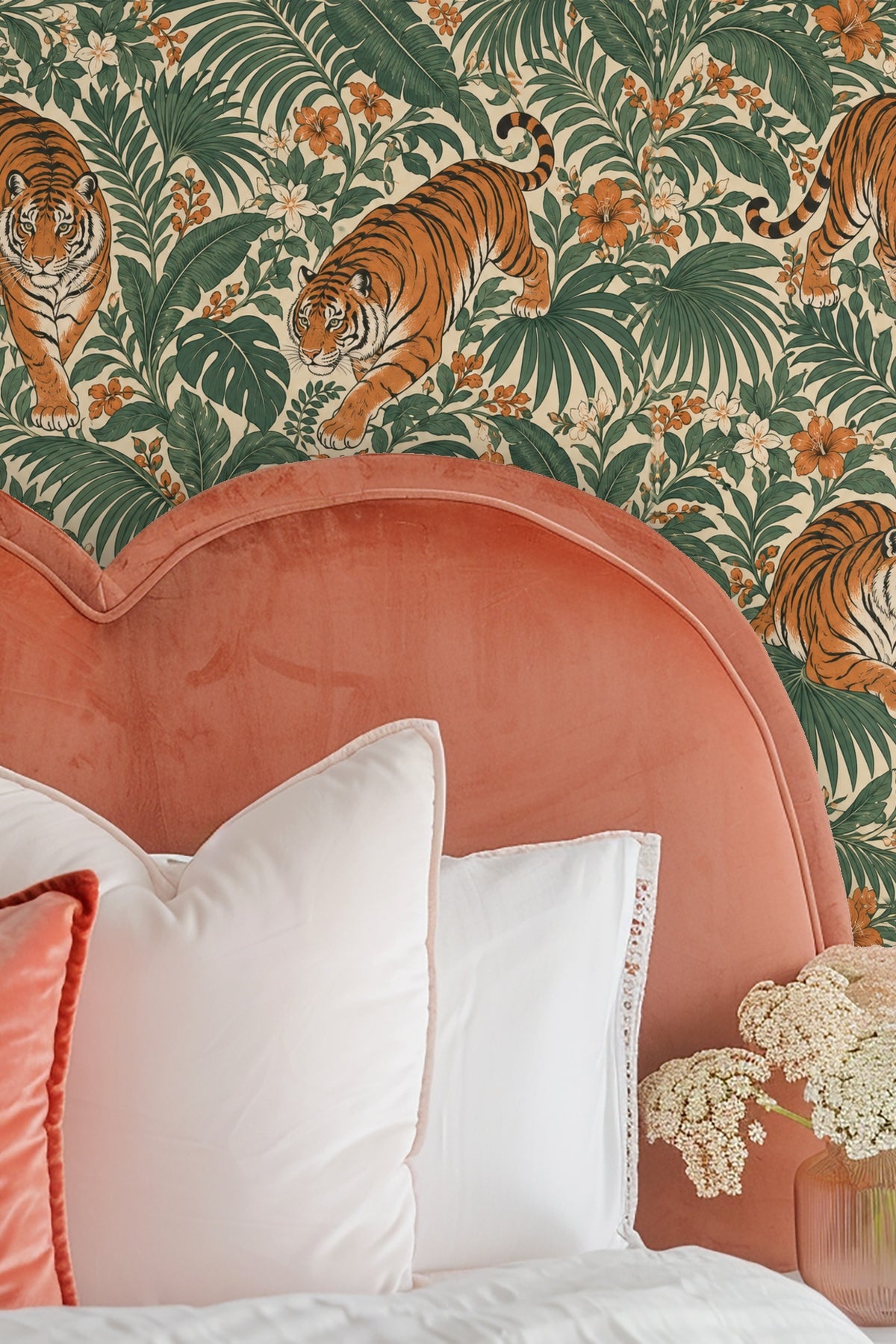 Tiger wallpaper in a bathroom setting with beige vanity and oval mirror.