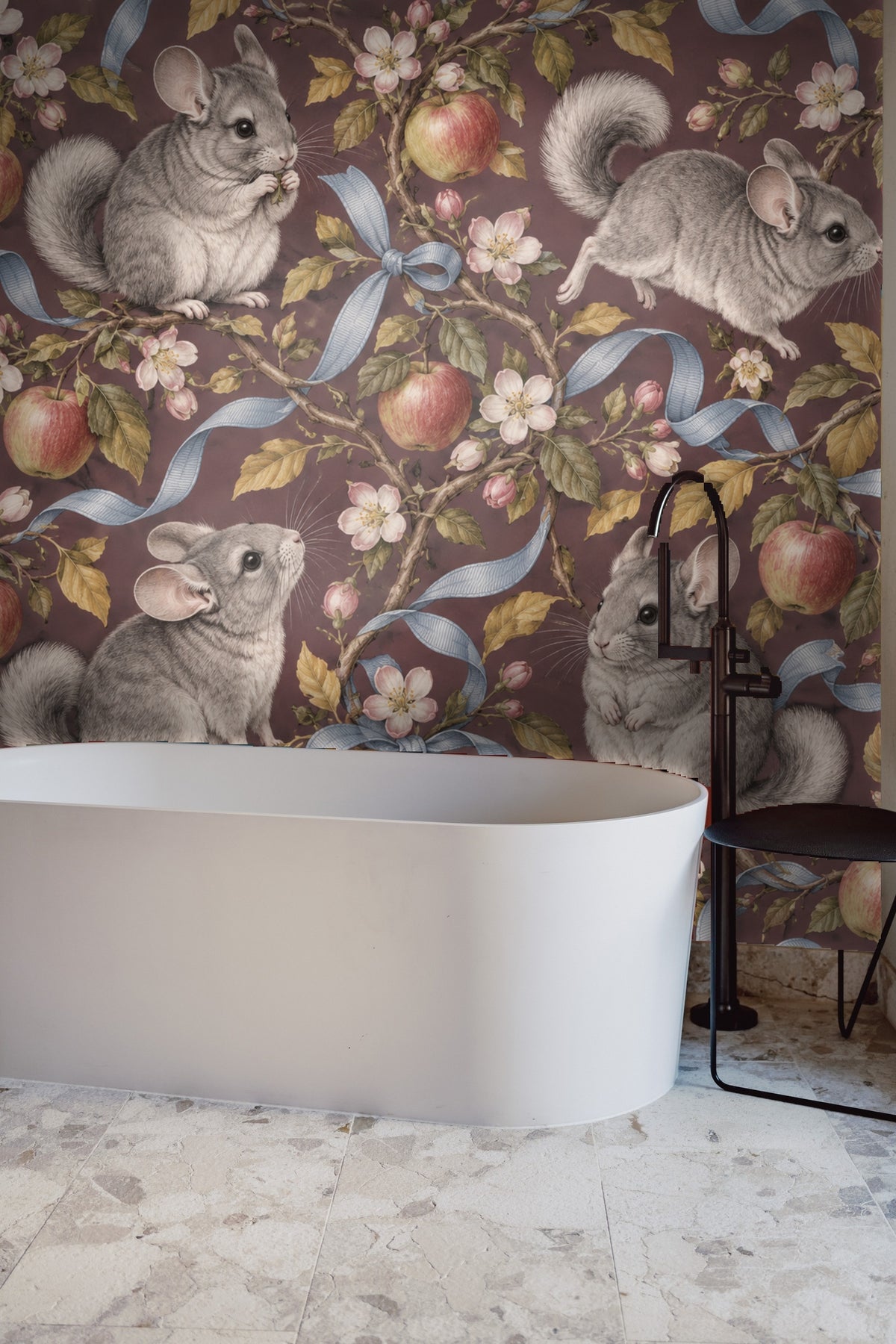 Chinchilla mid-leap over branches set against detailed leaves and fruit on wallpaper panel.