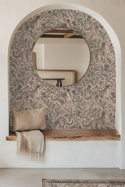 Detailed view of wallpaper showing hand-drawn whippets with thistles in muted purples and greens on beige background