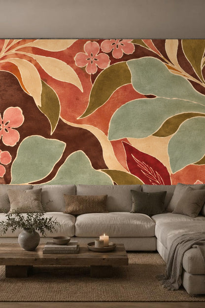 Stylized botanical wallpaper pattern with large leaves and soft flowers in shades of carmine, olive green, beige, and muted terracotta.
