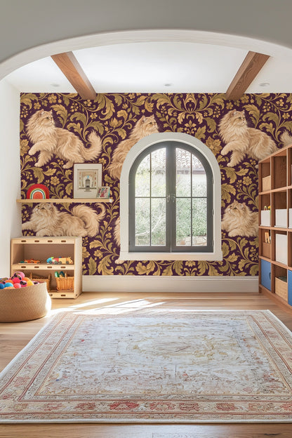 Wide shot of a deep plum wallpaper wall adorned with walking and sitting Persian cats rendered in warm gold tones.