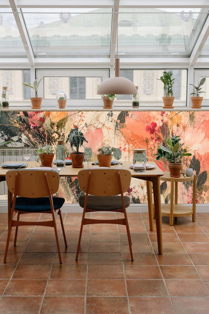 Living room wall covered in coral and green floral abstract mural