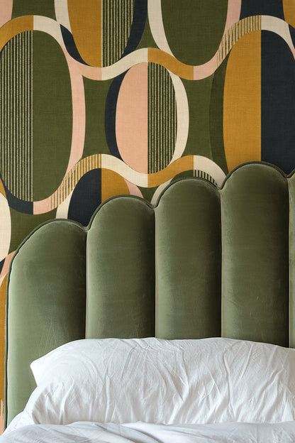 Oval Groove Wallpaper pattern detail showing interlocking ovals and textured stripes in olive, mustard, peach, black, and ivory.