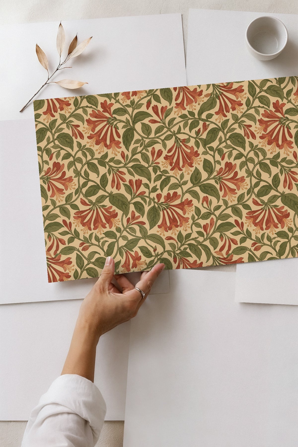 Organic leaf shapes with subtle shading bringing a hand-drawn quality to the pattern