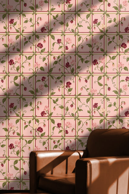 Wallpaper pattern showing soft pink and raspberry flowers with pale green leaves