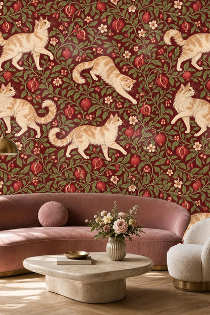 Close-up view of original wallpaper artwork showing creamy ginger cats and red pomegranates on a deep crimson background