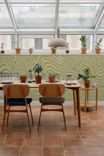 Textured olive-hued wallpaper with flowing topographic shapes