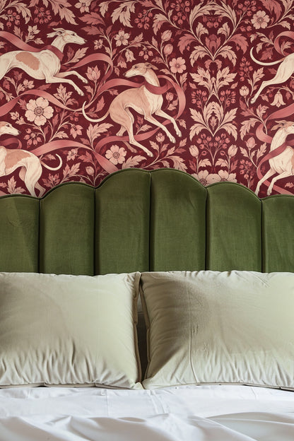 Living room with crimson floral greyhound wallpaper behind a neutral beige sofa and wooden coffee table.