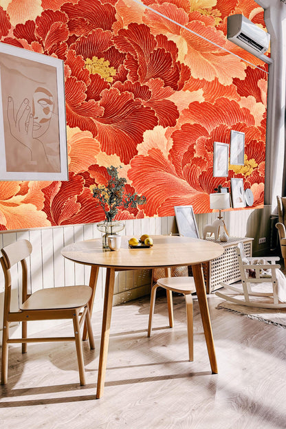 Pattern repeat of coral and red floral wallpaper with gold centered blooms