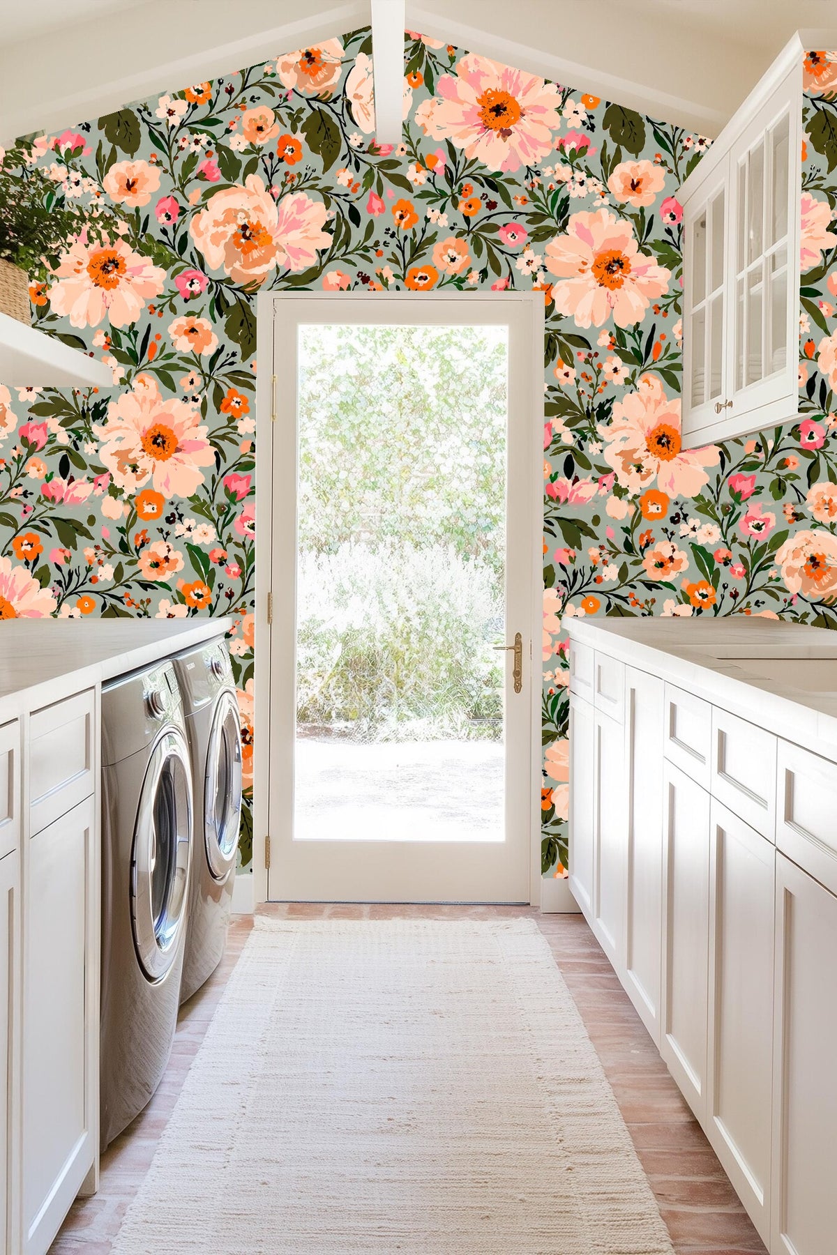 Soft peach petals and vibrant coral flowers against blue-gray background