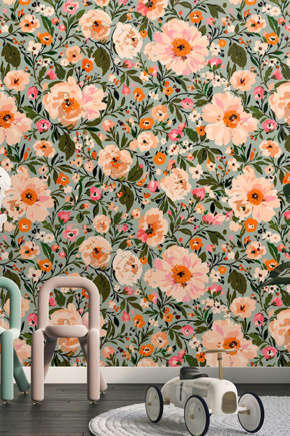 Detail of coral and pink flowers with dark centers on wallpaper