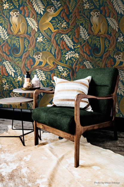 Vibrant teal wallpaper as seen in a cozy, nature-inspired room interior