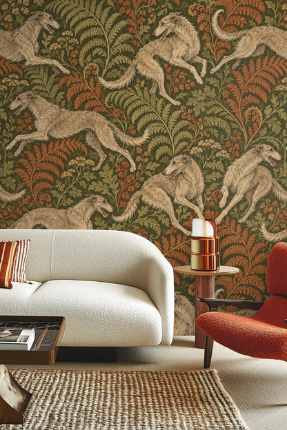 Living room setting with Woodland Whippet Chase wallpaper, neutral sofa, wooden coffee table, and woven rug.