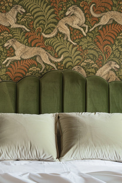 Detailed wallpaper illustration of greyhounds leaping across a botanical background of green and rust ferns.