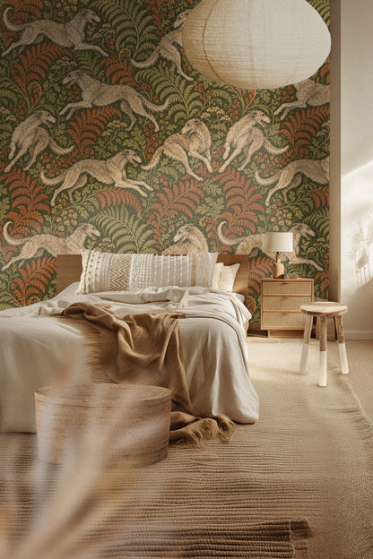 Living room interior featuring Borzoi Fern Dance wallpaper behind a pink velvet sofa and cream armchair with round coffee table