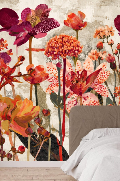Kitchen wall featuring bold red and coral floral wallpaper with white cabinetry and gray countertop.
