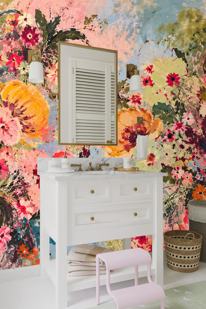 Living room with coral and orange floral wallpaper, cream sofa, and gold coffee table.