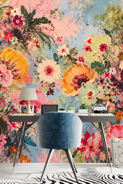 Close-up detail of bright flower petals and green leaves in floral wallpaper artwork.