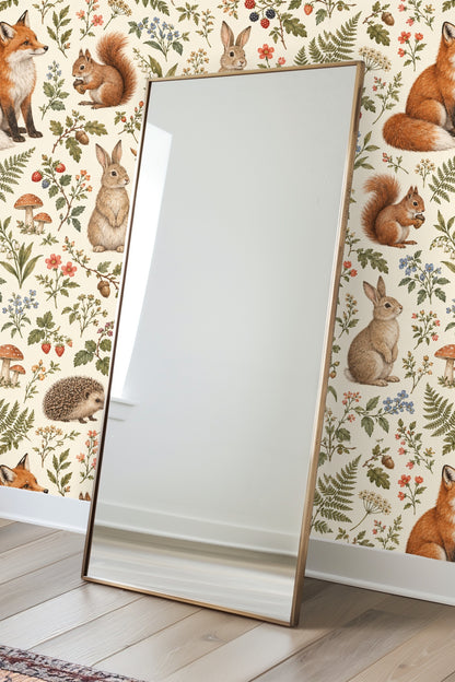 Rabbit sitting upright among delicate wildflowers and acorns on wallpaper.