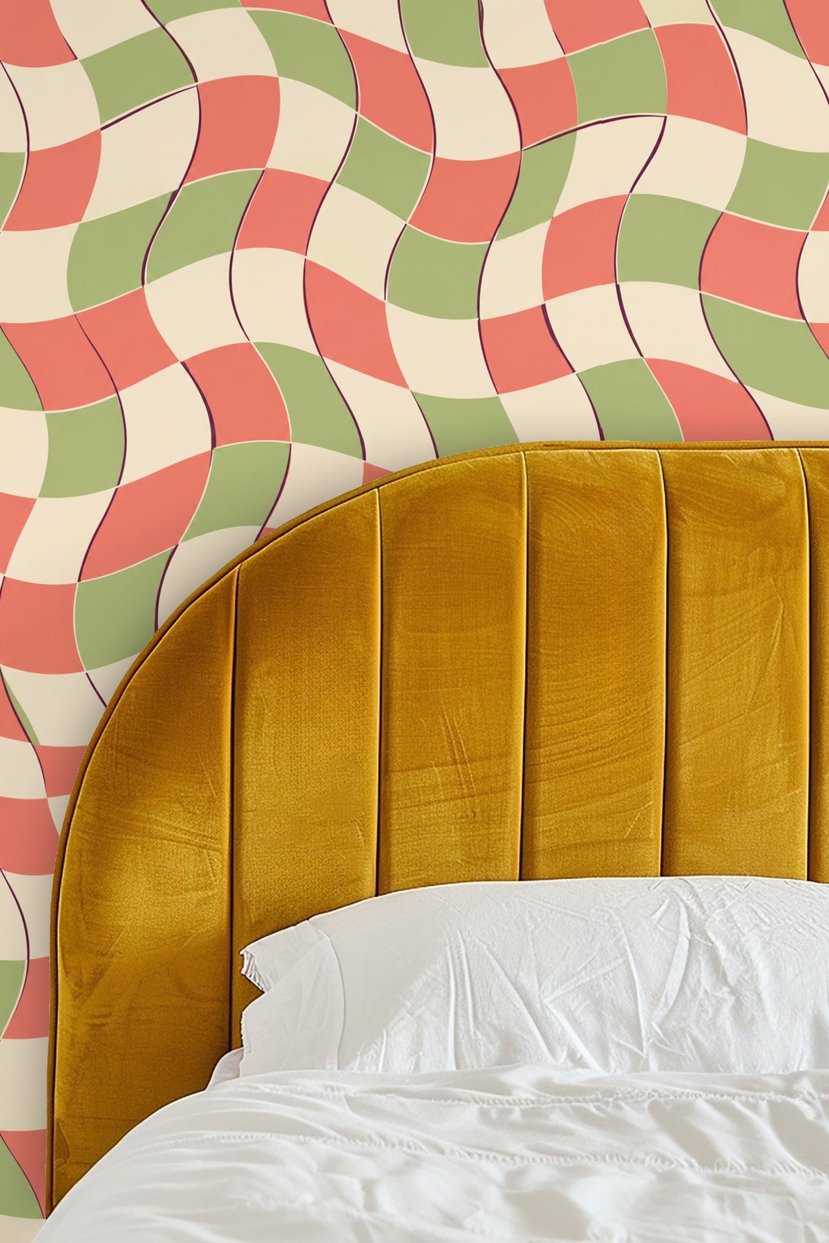 Living room with orange couch and retro wave pattern wallpaper behind.