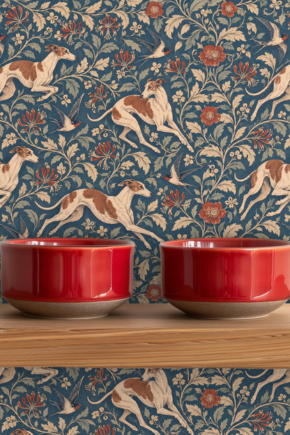 Leaping whippets positioned diagonally within a botanical pattern on wallpaper.