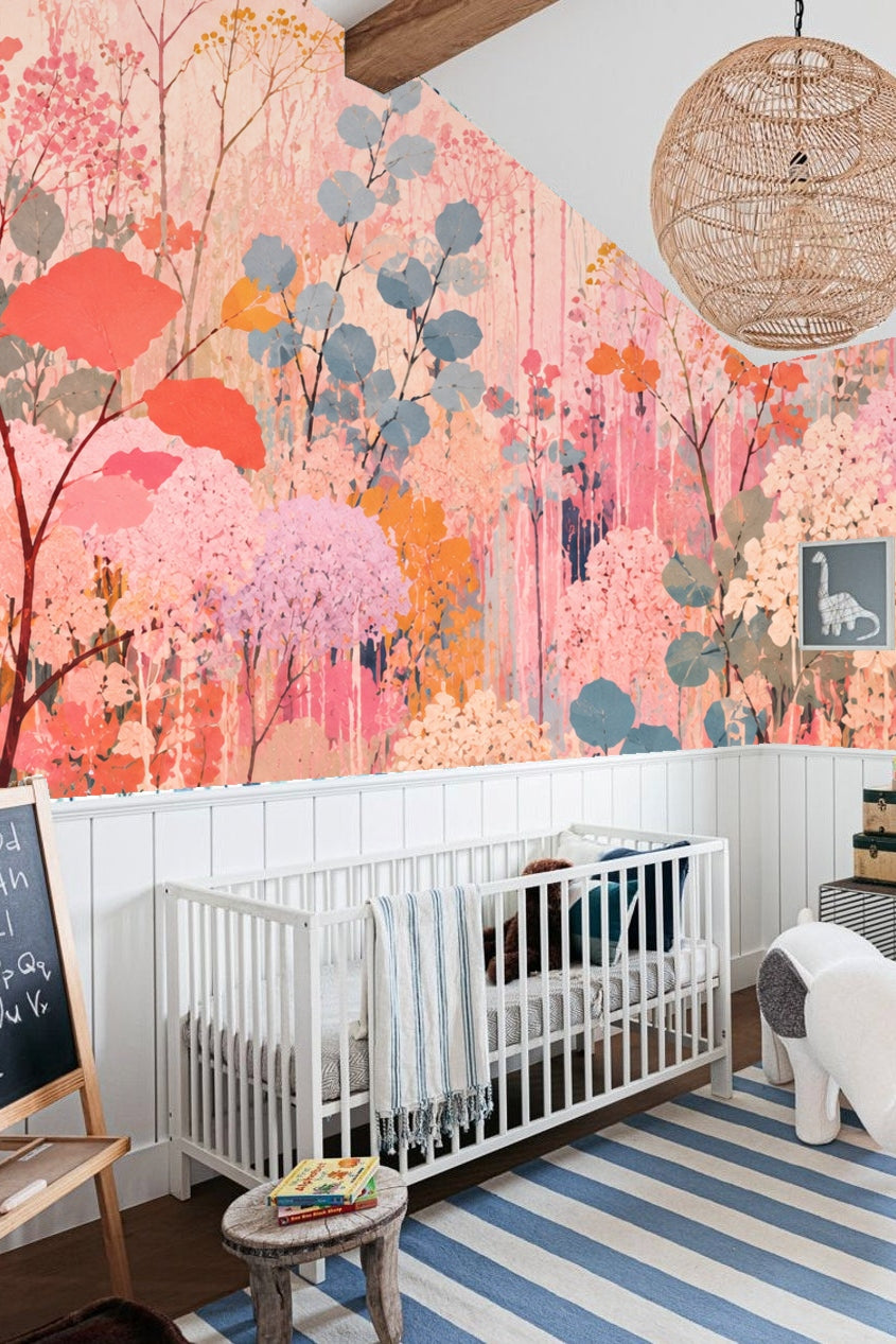 Bedroom interior with gray bedding and a pink and coral floral wallpaper behind the bed