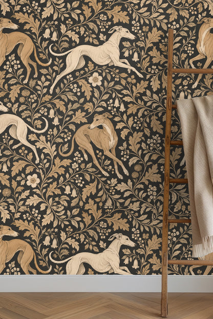 Room close-up showing hound wallpaper with black background and beige florals alongside wooden tabletop with candle and flowers