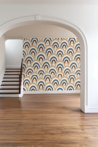 wide shot of a neutral bedroom showing arch pattern wallpaper behind a rattan bed frame