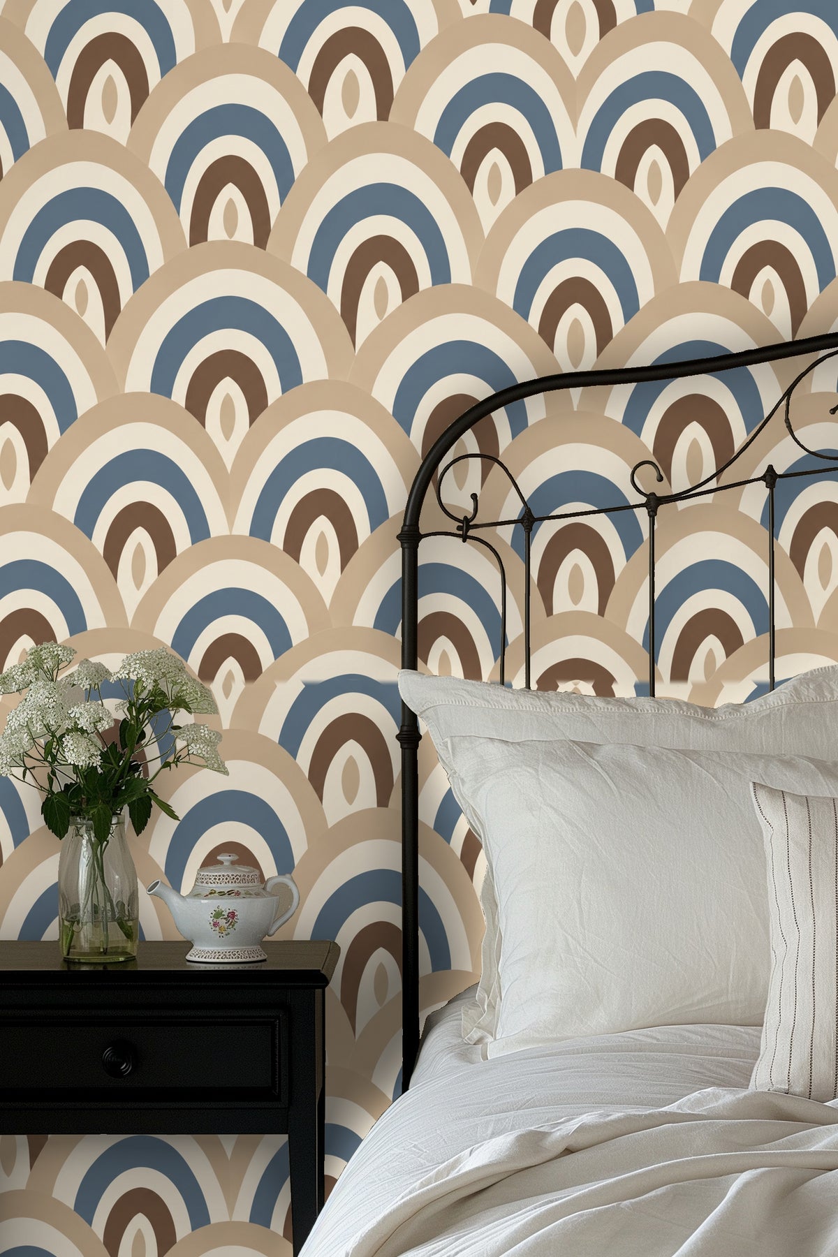 living room vignette highlighting arch motif wallpaper against soft furniture