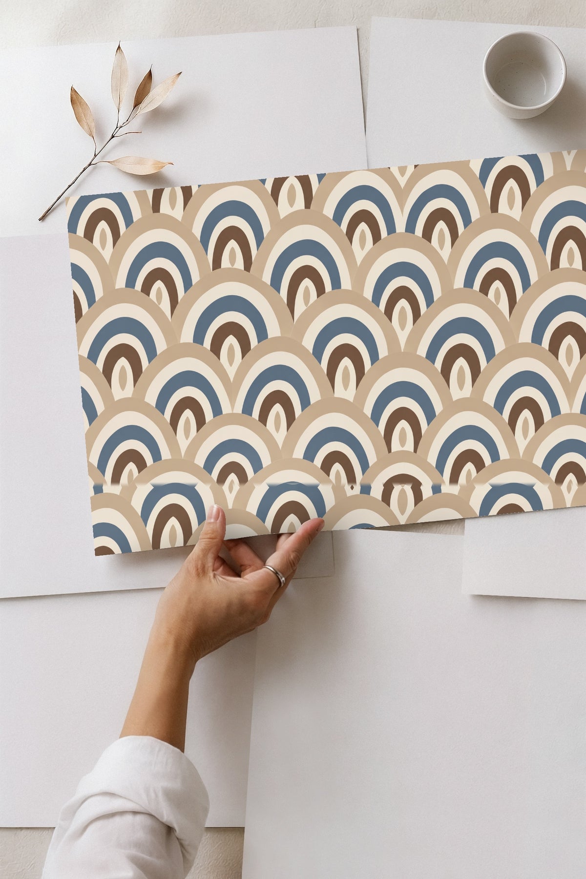 graphic detail emphasizing the layered arcs and discreet brush strokes