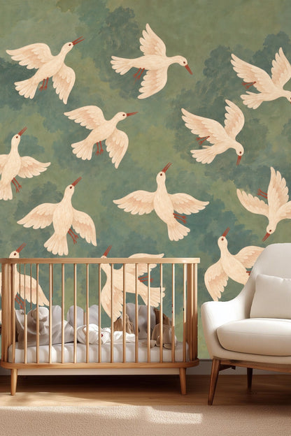 Bedroom with bed and wooden furniture featuring wallpaper with white doves flying against a green and blue sky background