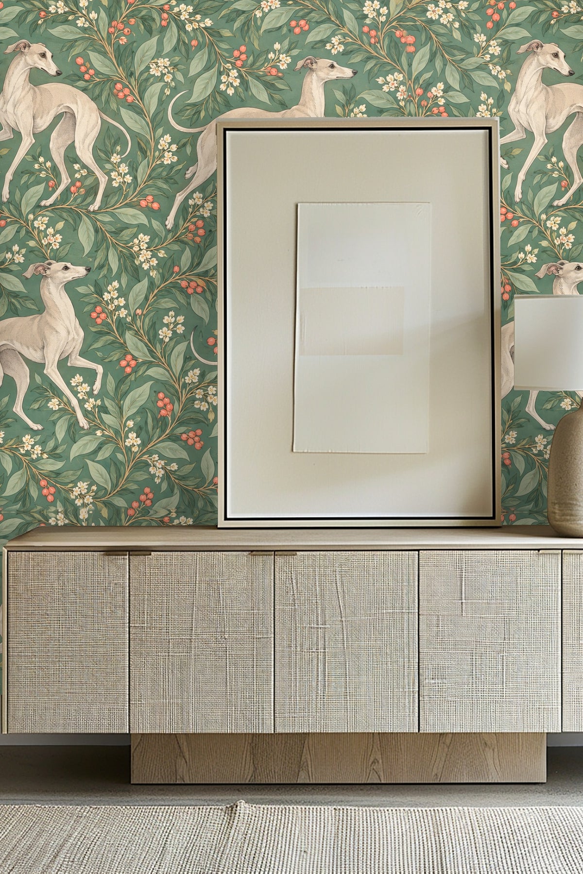 Entryway featuring Trailing Whippets wallpaper behind a light wood credenza and framed abstract art
