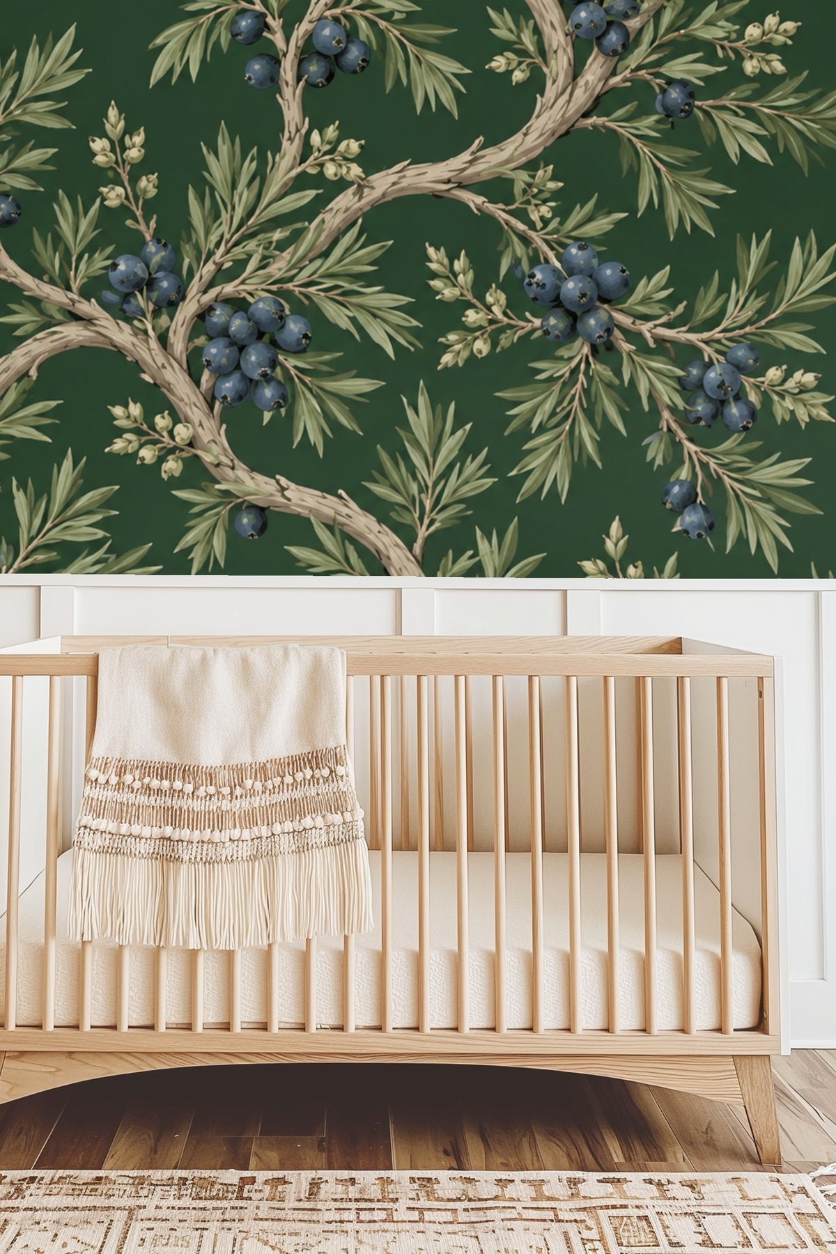 Bedroom scene with coral velvet headboard against deep green Juniper Grove wallpaper featuring detailed juniper branches and berries.