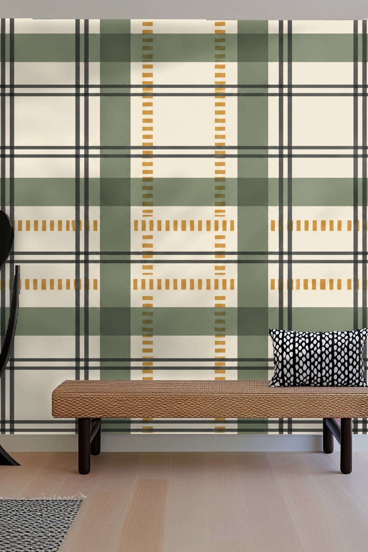 Living room with olive velvet sofa, orange stool, framed blue line art, and Architect Plaid wallpaper