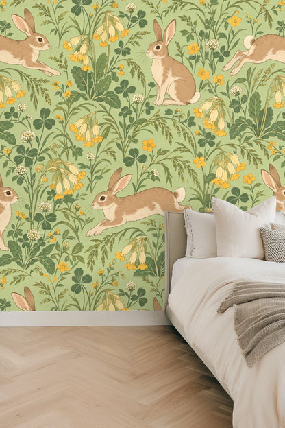 Sitting rabbit facing right with subtle line shading surrounded by clover leaves and wildflowers.