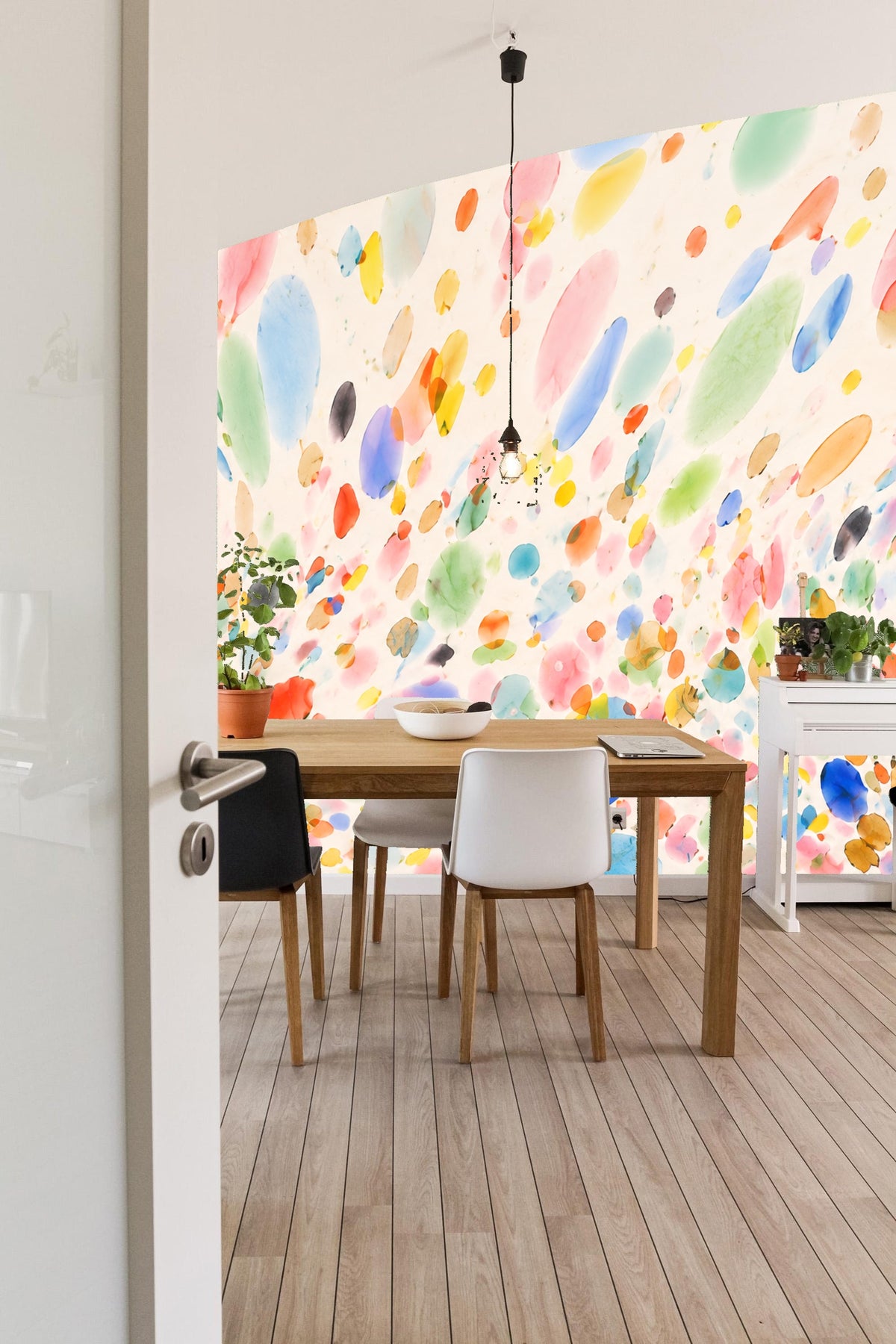 Various-sized watercolor droplet shapes in blues, pinks, yellows, greens, and oranges.