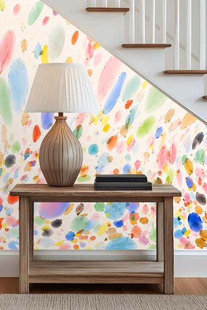 Splash of translucent color blotches with an off-white background.