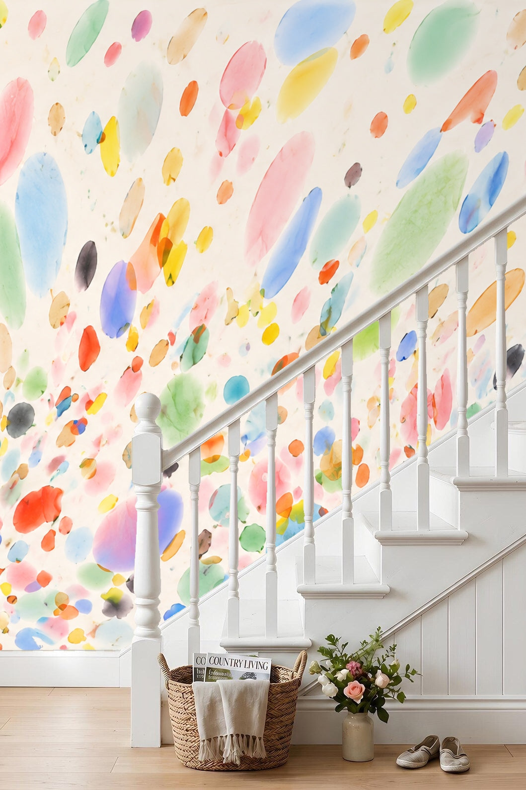 Modern interior featuring lively, playful watercolor wallpaper behind neutral furniture.