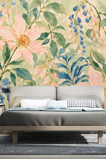 Watercolor leaf shapes overlapping with soft pink and blue flowers