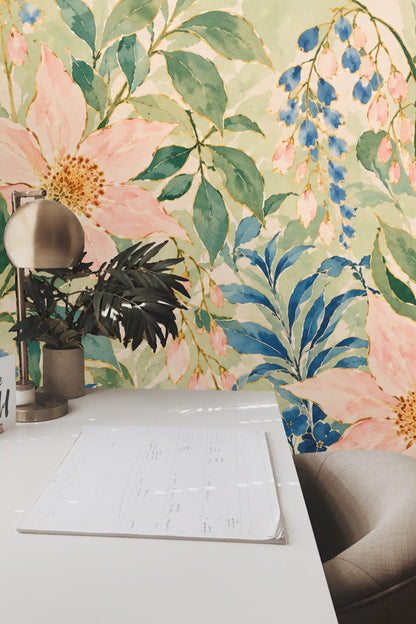 Close-up of delicate leaves and flowers in muted green, pink, and blue tones
