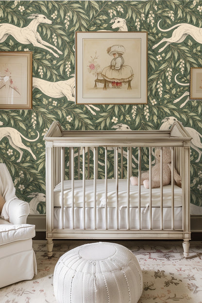 Curved pink velvet sofa and cream chair in living room with Whippet Holly Garland wallpaper.