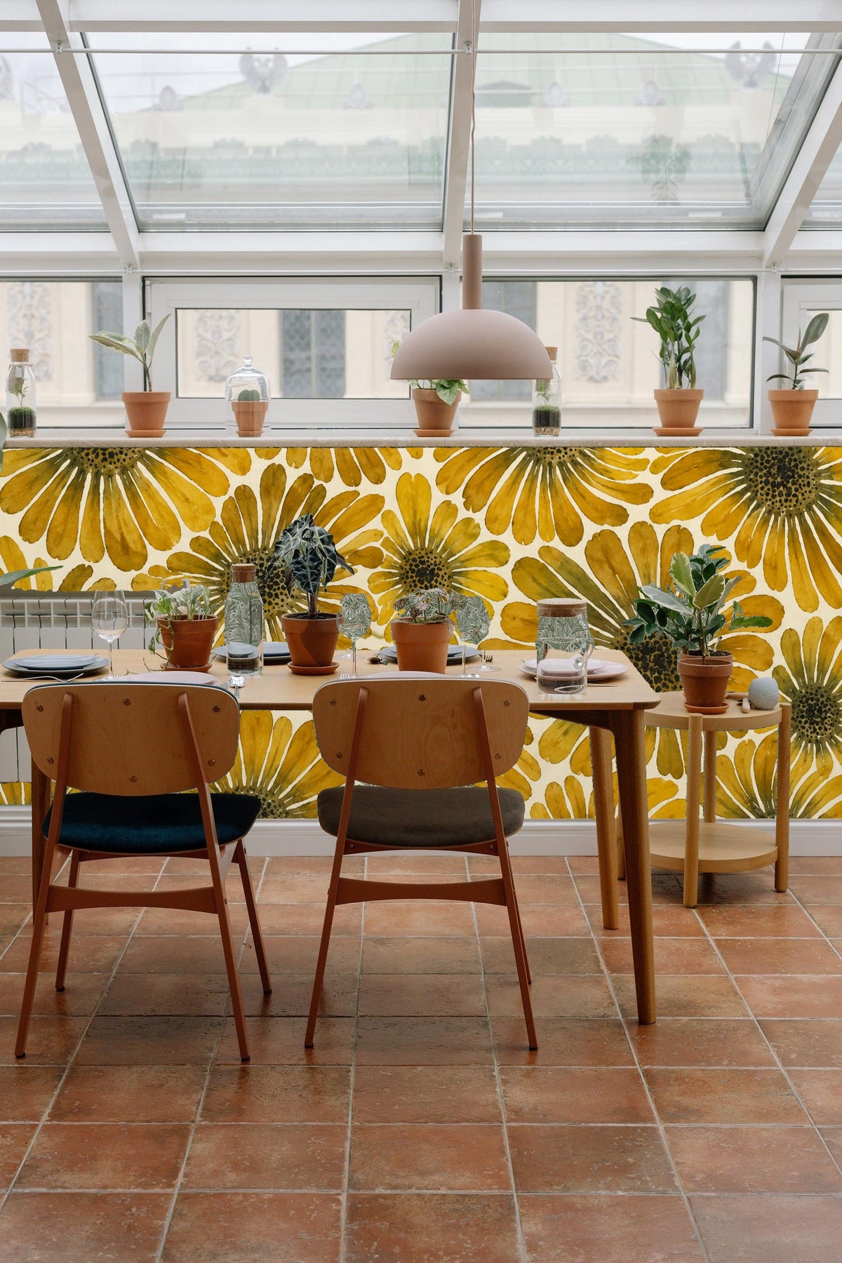 Elegant bedroom wall covered in floral daisy wallpaper with vintage midcentury style colors