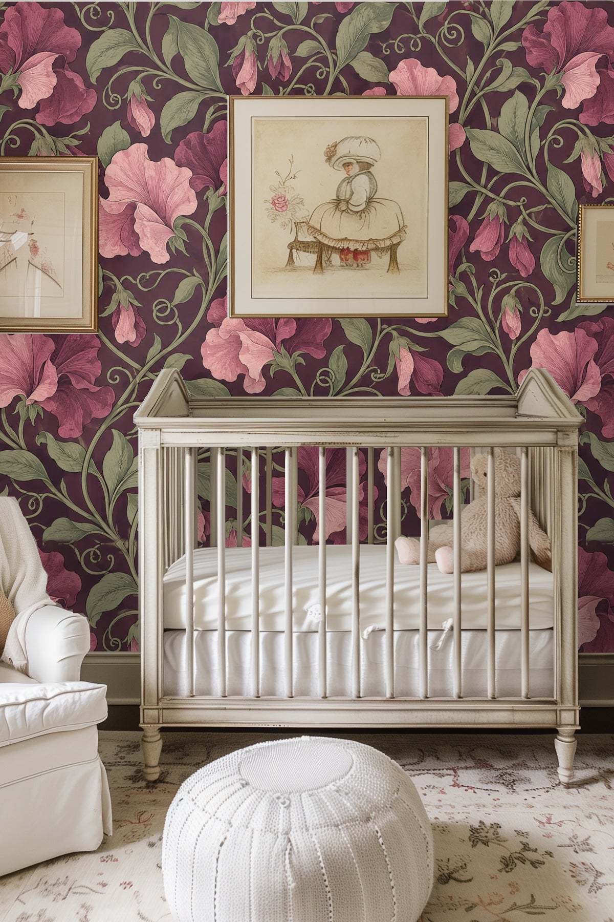 Close-up of dusty pink and purple sweet pea petals and olive green leaves on plum wallpaper background