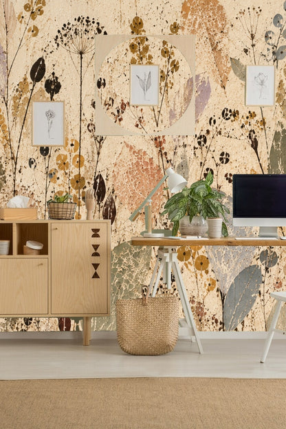 Wallpaper artwork detail showing cracked surface with muted botanical leaves and seed pods