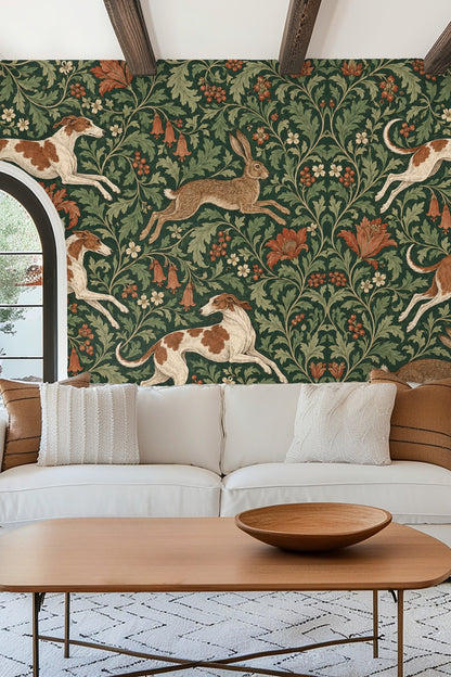 Bedroom with accent wall covered in Fleetwood Hare and Hound wallpaper, featuring green foliage with running dogs and hares