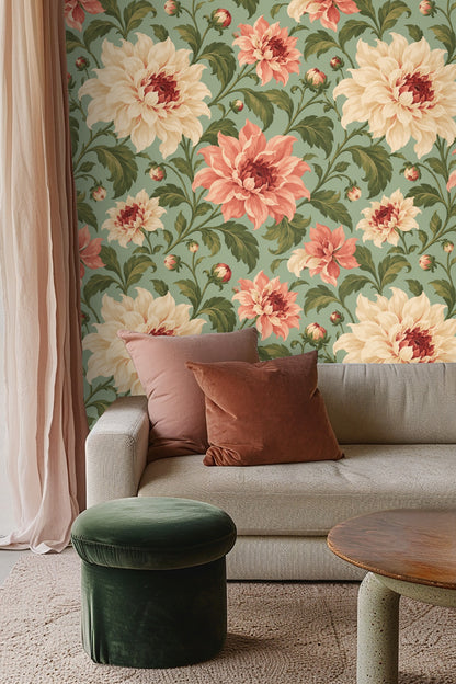 Living room interior with beige sectional couch partly in frame, floral wallpaper behind in coral and cream tones