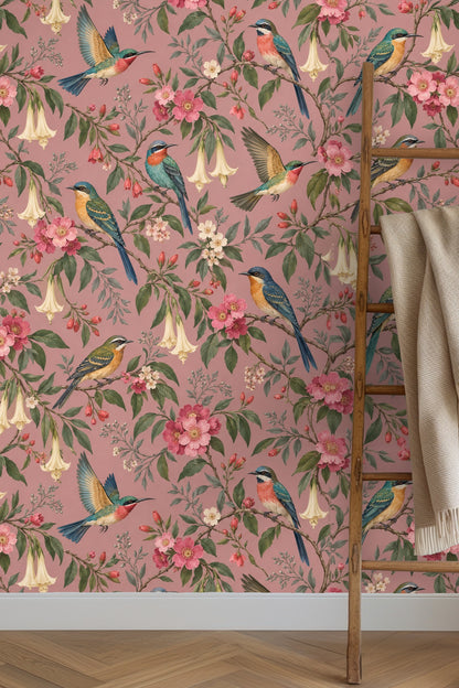 Wallpaper detailed view showing birds perched among pink blossoms and trumpet flowers on dusty rose background