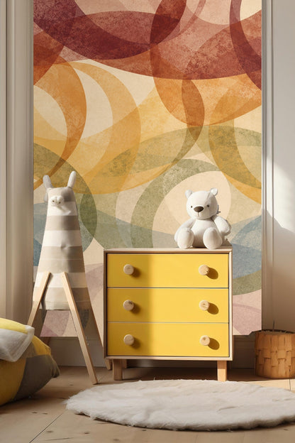 Abstract wallpaper with overlapping elliptical loops in terracotta, ochre, olive green, blue, and mauve on cream background