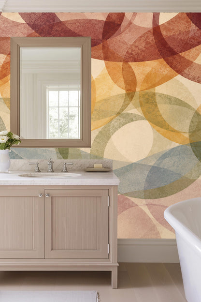 Softly blended elliptical arcs with a rough textured finish in warm earth tones